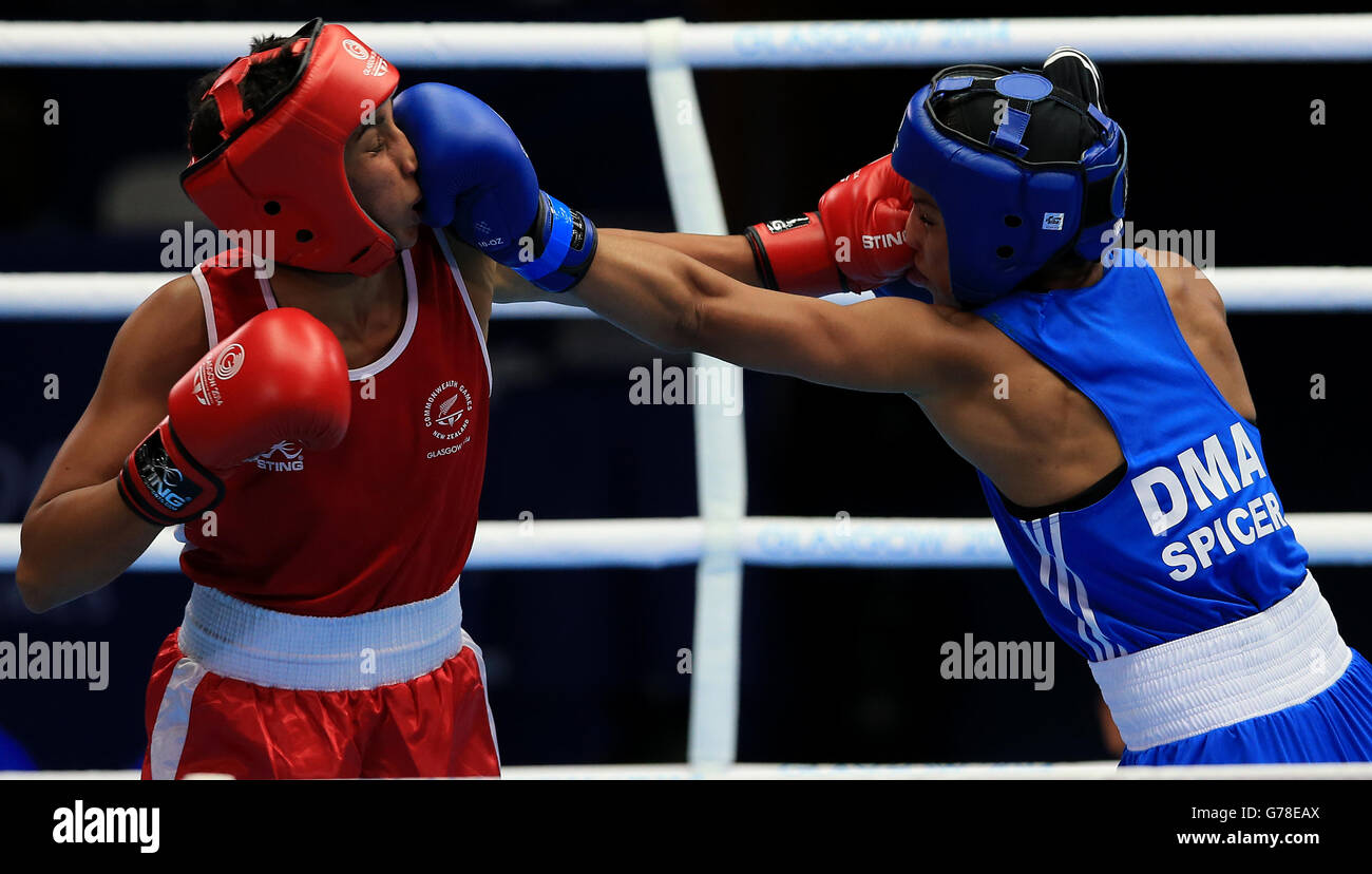 Alexis Pritchard, de Nouvelle-Zélande, est en compétition avec Valerian Spicerin, de la Dominique, le poids léger des femmes de 57 à 60 kg au SECC, lors des Jeux du Commonwealth de 2014 à Glasgow. APPUYEZ SUR ASSOCIATION photo. Date de la photo: Mardi 29 juillet 2014. Voir PA Story COMMONWEALTH Boxing. Le crédit photo devrait se lire comme suit : Peter Byrne/PA Wire. RESTRICTIONS: . Aucune utilisation commerciale. Pas d'émulation vidéo. Banque D'Images