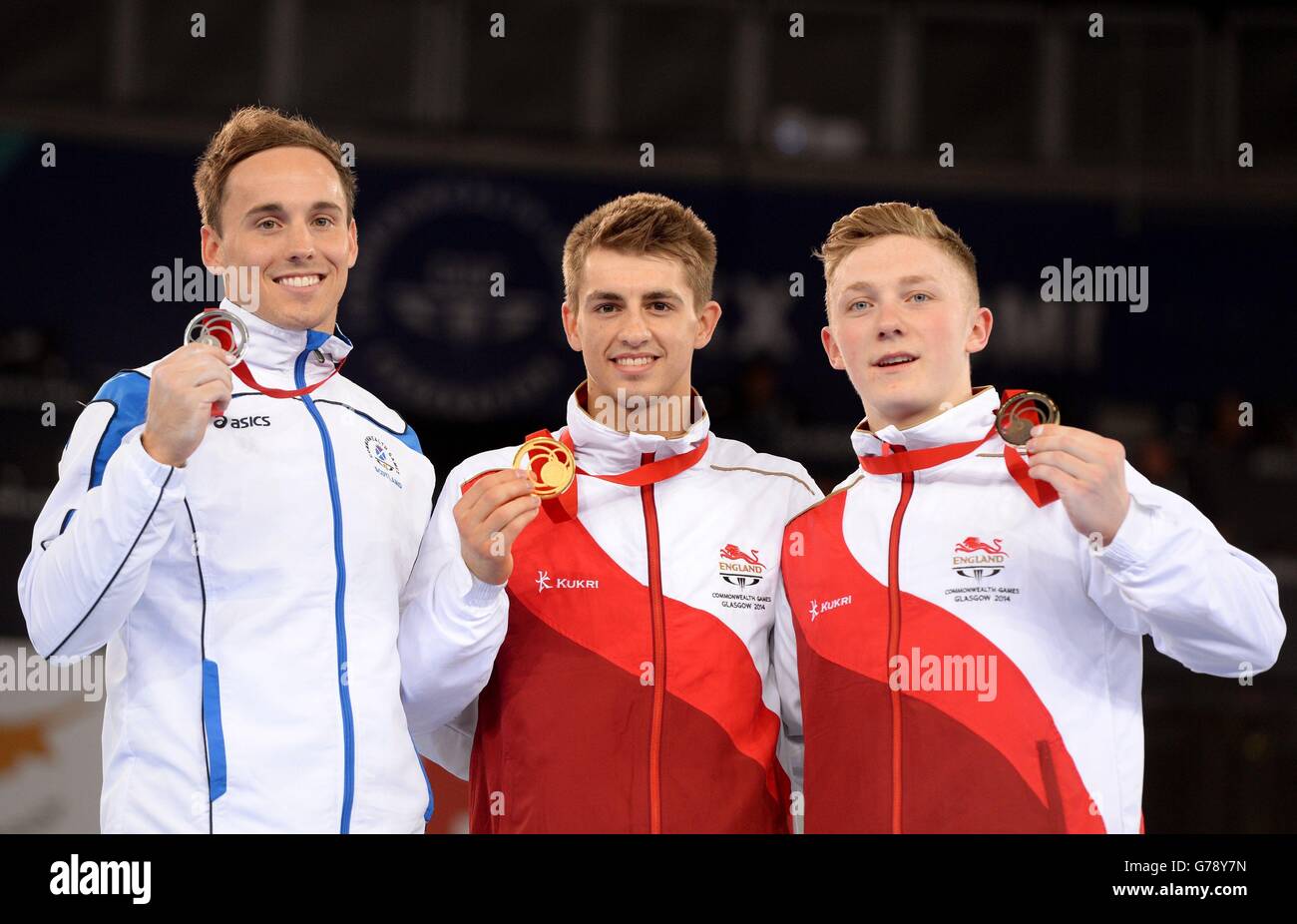 (De gauche à droite) médaillée d'argent Daniel Keatings en Écosse, médaillée d'or Max Whitlock en Angleterre et médaillée de bronze Nile Wilson en Angleterre sur le podium après la finale de gymnastique artistique masculine à SSE Hydro, lors des Jeux du Commonwealth de 2014 à Glasgow. Banque D'Images