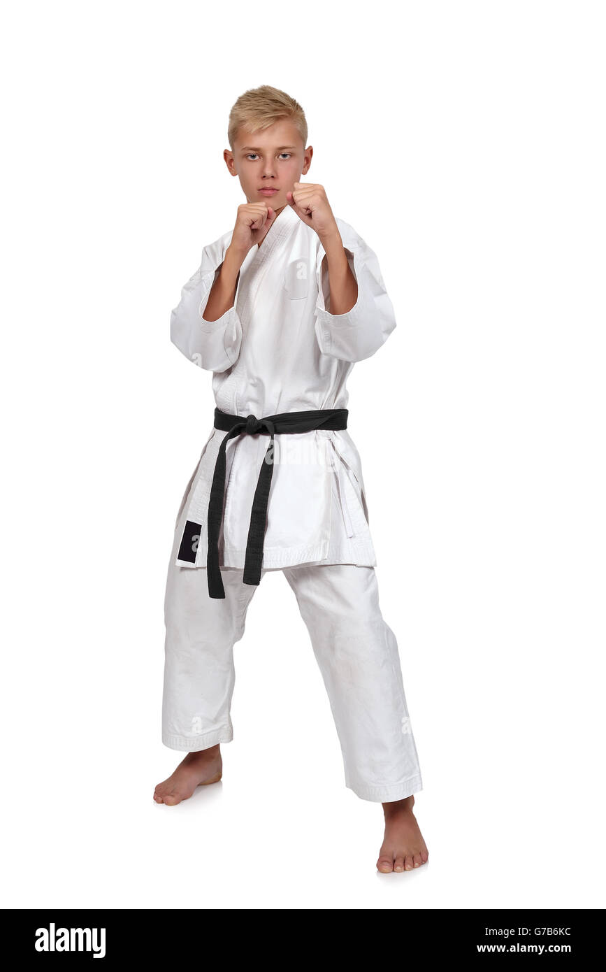 Karate boy en kimono blanc avec ceinture noire Banque D'Images