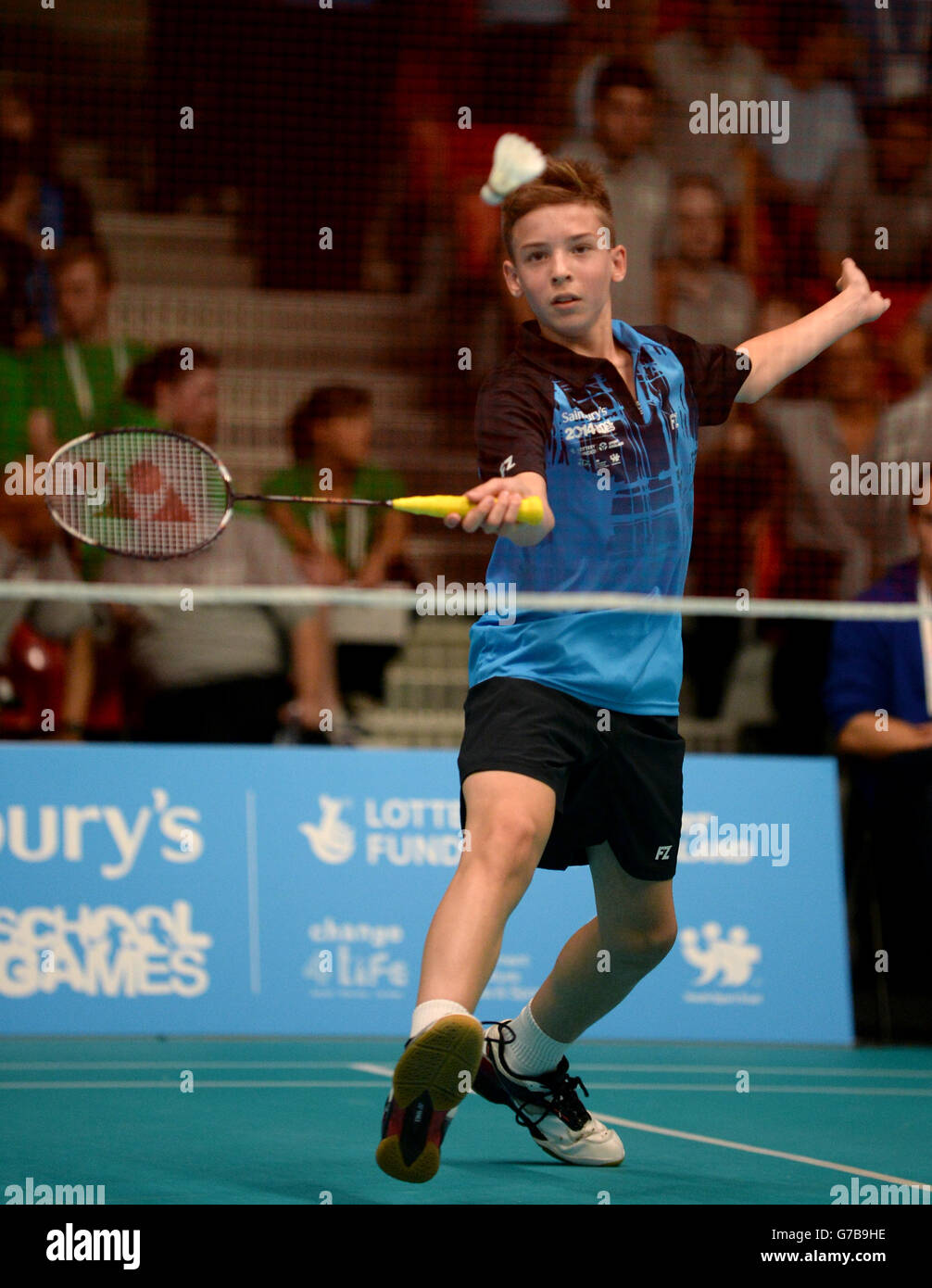 Matthew Grimley, en Écosse, participe au badminton lors des Jeux scolaires de Sainsbury en 2014 à Armitage, Manchester. APPUYEZ SUR ASSOCIATION photo. Date de la photo : vendredi 5 septembre 2014. Le crédit photo devrait se lire comme suit : Tony Marshall/PA Wire. Banque D'Images