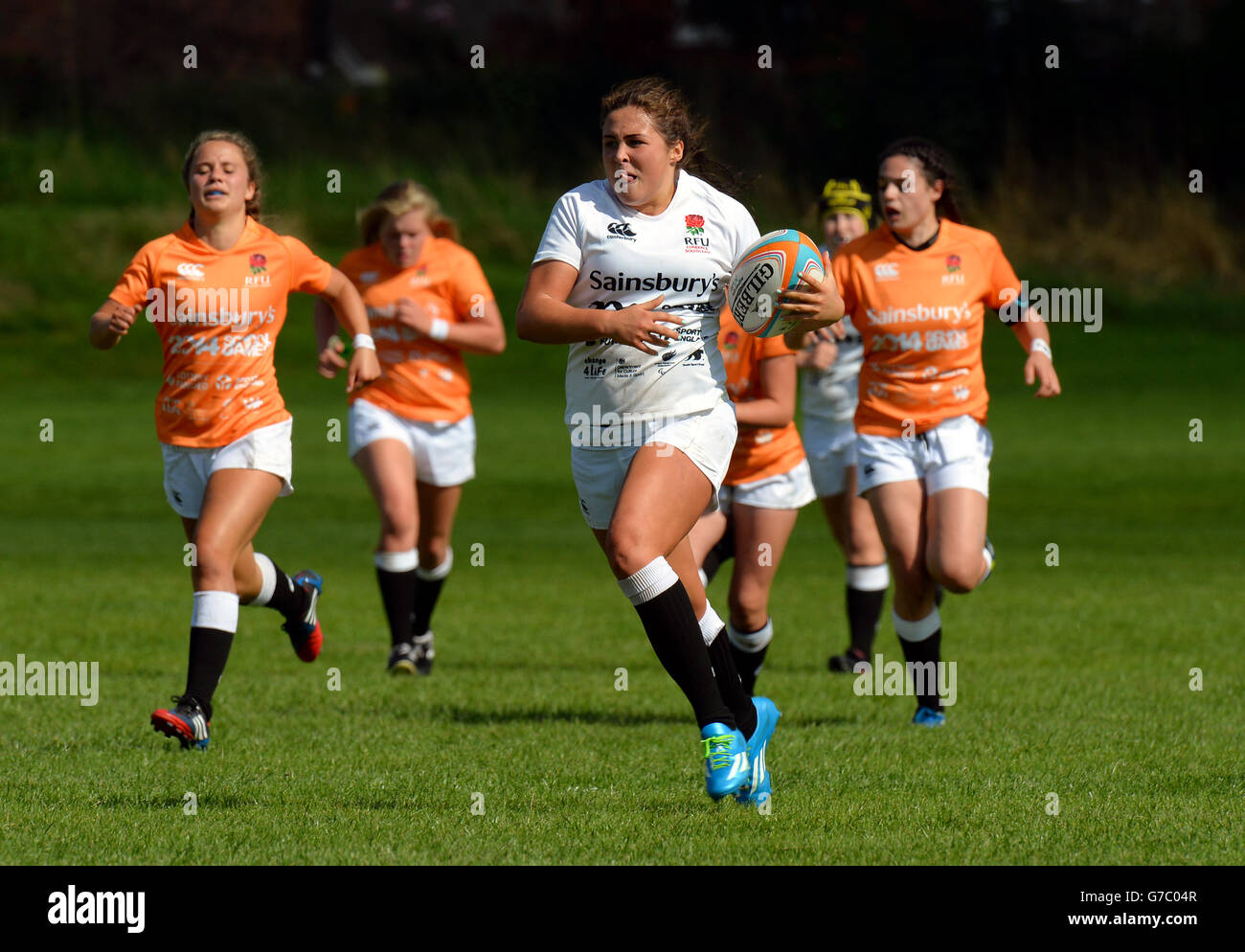 Action de l'Angleterre du Sud-Ouest contre l'Angleterre Londres et le Sydney Gregson du Sud-est lors de la finale de rugby à sept aux Sainsbury's School Games 2014, Armitage site, Manchester. Banque D'Images