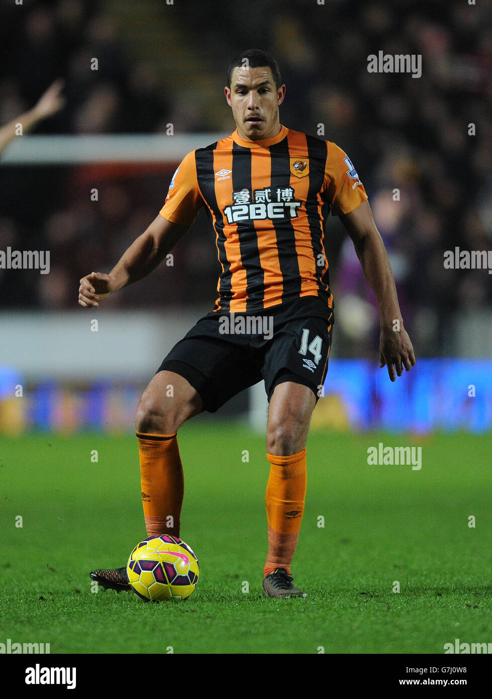 Jake Livermore de Hull City pendant le match de la Barclays Premier League au KC Stadium, à Hull. APPUYEZ SUR ASSOCIATION photo. Date de la photo: Dimanche 28 décembre 2014. Voir PA Story SOCCER Hull. Le crédit photo doit indiquer Anna Gowthorpe/PA Wire. 45 images maximum pendant une comparaison. Pas d'émulation vidéo ni de promotion en direct. Aucune utilisation dans les jeux, les compétitions, les marchandises, les Paris ou les services de club/joueur unique. Ne pas utiliser avec les fichiers audio, vidéo, données, présentoirs ou logos de club/ligue non officiels. Banque D'Images