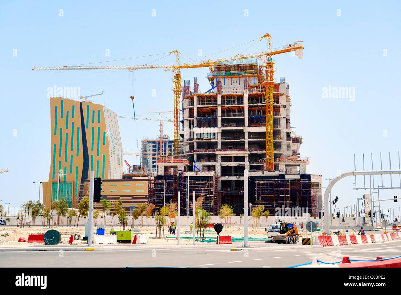 Al bandary engineering's commercial tower en construction. quartier du port de plaisance du développement rapide de nouvelles ville de lusail, au Qatar Banque D'Images