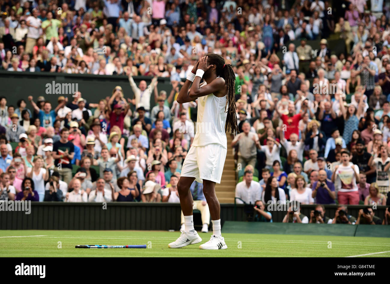 Dustin Brown célèbre Rafael Nadal le quatrième jour des championnats de Wimbledon au All England Lawn tennis and Croquet Club, Wimbledon. Banque D'Images