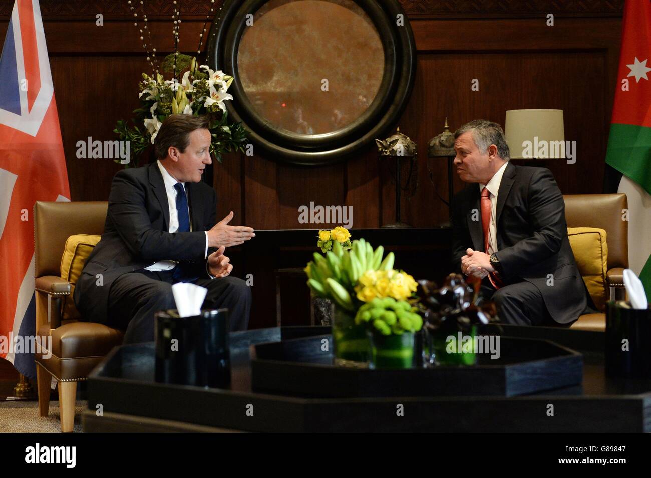 Le Premier ministre David Cameron rencontre le roi Abdallah de Jordanie à Amman, après avoir appelé d'autres pays de l'UE à « se mettre à la hauteur » et à suivre l'exemple de la Grande-Bretagne en finançant des camps de réfugiés autour de la Syrie. ASSOCIATION DE PRESSE lundi 14 septembre 2015. M. Cameron a déclaré qu'il existait un « lien de discorde » entre les insuffisances de l'aide aux camps au Liban, en Jordanie et en Turquie et l'afflux de migrants en Europe. Voir PA Story POLITICS Cameron. Le crédit photo devrait se lire comme suit : Stefan Rousseau/PA Wire Banque D'Images