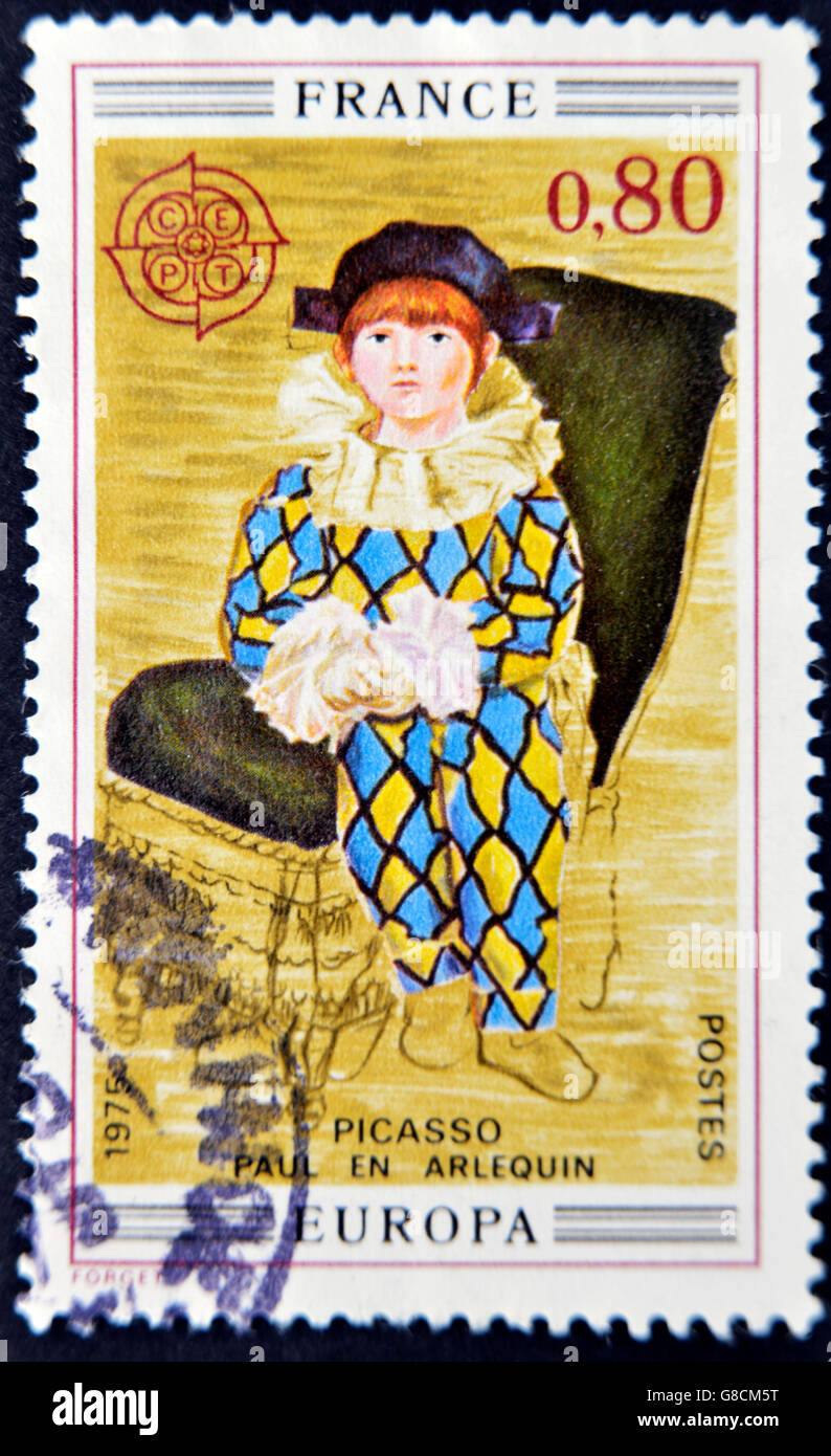 FRANCE - circa 1975 : timbre imprimé en France montre le travail 'Paul l' arlequin de Pablo Picasso, vers 1975 Banque D'Images