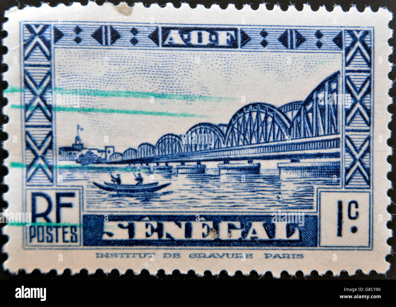 Sénégal - circa 1931 : timbre imprimé au Sénégal montrent le pont Faidherbe, vers 1931. Banque D'Images