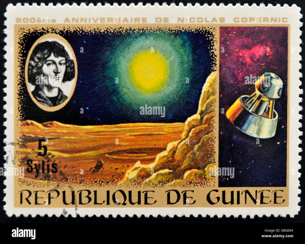 La guinée VERS 1973 : timbres par la Guinée, dédié à l'anniversaire de Nicolas Copernic montre lune paysage et spacecr Banque D'Images