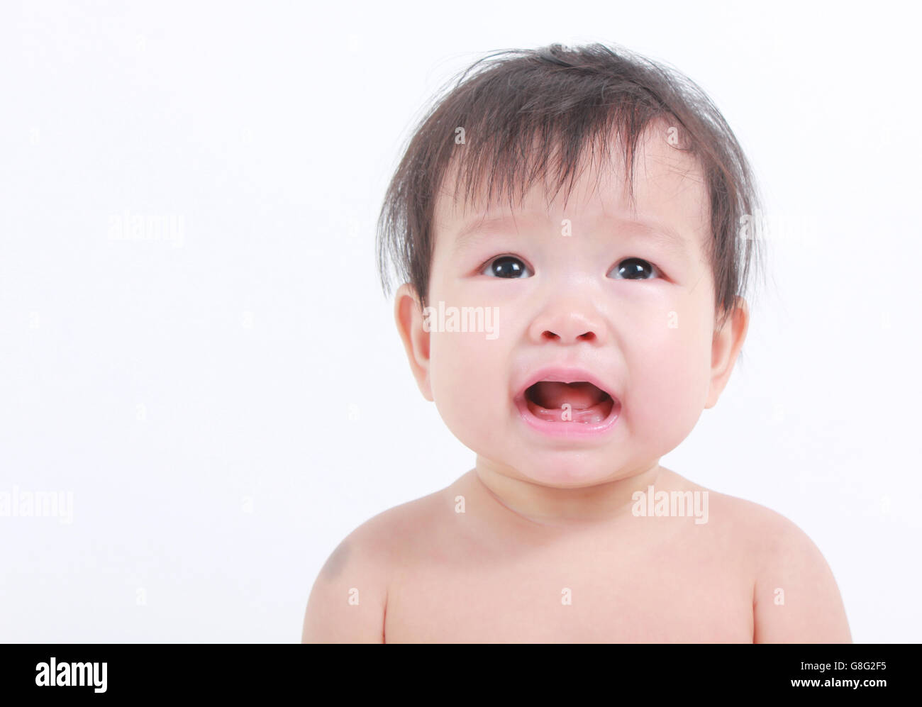 Cute asian baby isolé sur blanc. Banque D'Images