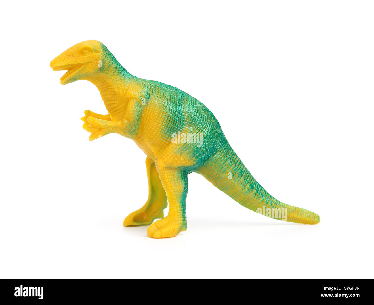 Vue côté jouet dinosaure vert sur fond blanc Banque D'Images