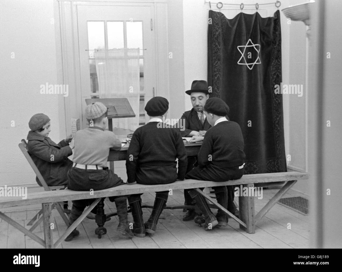 Le rabbin orthodoxe de l'enseignement de la religion pour les enfants juifs, Jersey, New Jersey, USA, Russell Lee, Novembre 1936 Banque D'Images