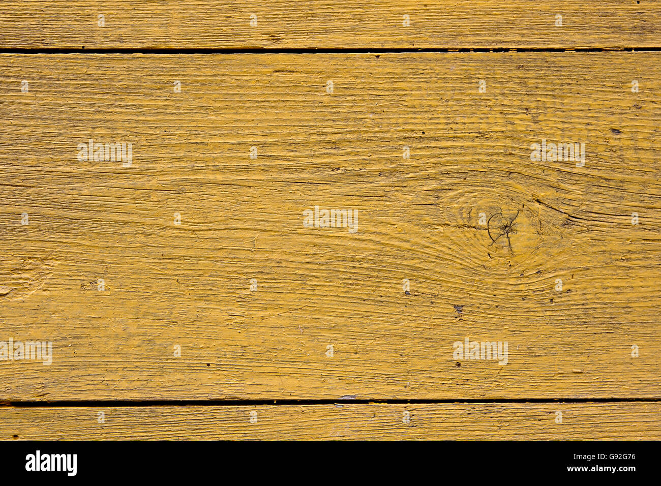 Texture bois avec peinture la couleur est arrachée. Peinture jaune écaillée - texture de fond en bois. Banque D'Images