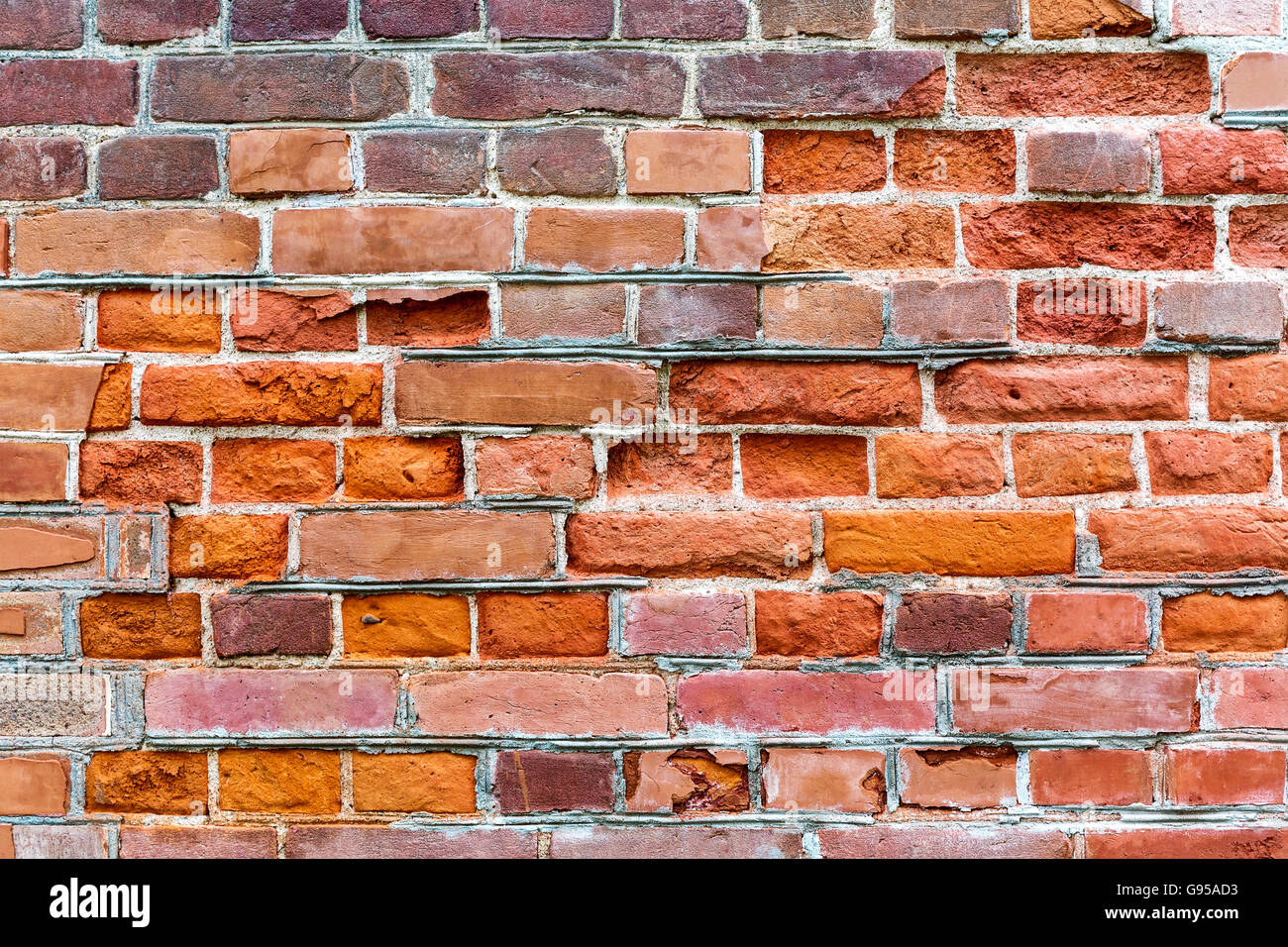 Old weathered mur de brique rouge en arrière-plan de surface Banque D'Images