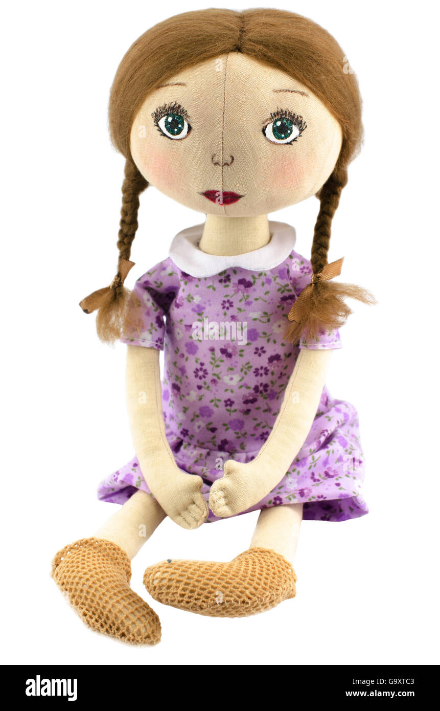 Poupée de chiffon Fille en rose isolé sur fond blanc Banque D'Images