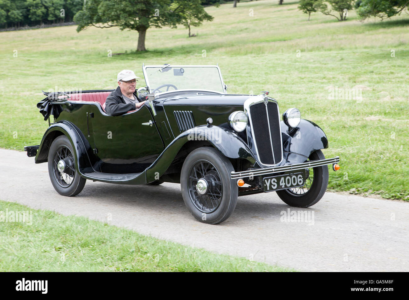 8 Morris à Leighton Hall Classic Car Rally, Carnforth, Lancashire, Royaume-Uni. 3 juillet, 2016. Le rallye automobile classique annuelle a lieu dans le magnifique hall Leighton dans Carnforth Lancashire. Les voitures de sport classiques britanniques allant de MG à l'American muscle cars comme la Dodge Viper et Ford Mustang. Le spectateur a attiré des milliers de visiteurs dans cette partie du pays pittoresque sur la côte nord-ouest de l'Angleterre. Credit : Cernan Elias/Alamy Live News Banque D'Images