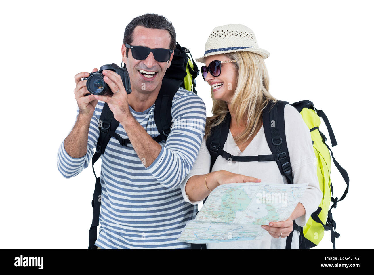 Cheerful couple transport des bagages Banque D'Images