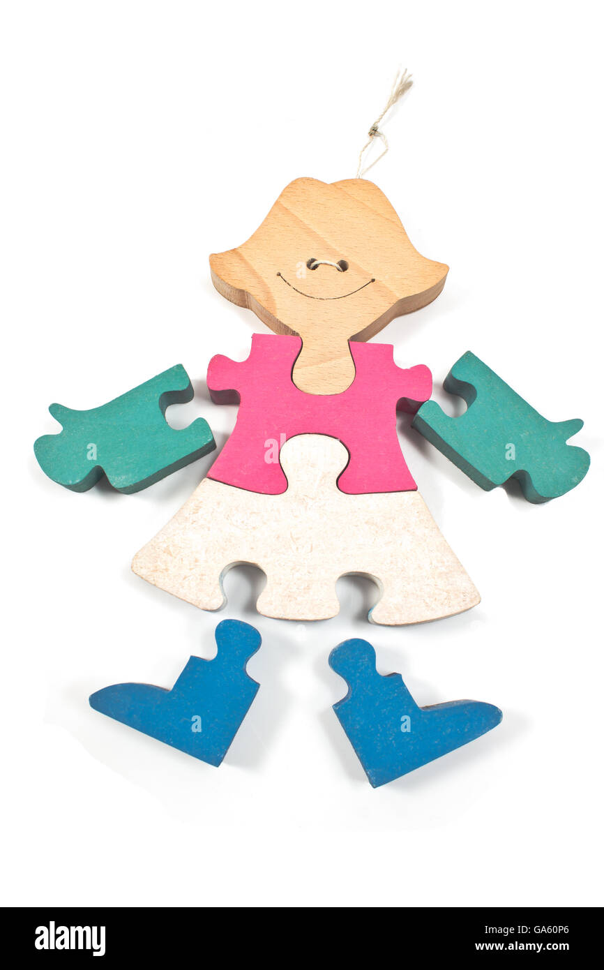 Pièces de puzzle en bois coloré girl isolated on white Banque D'Images