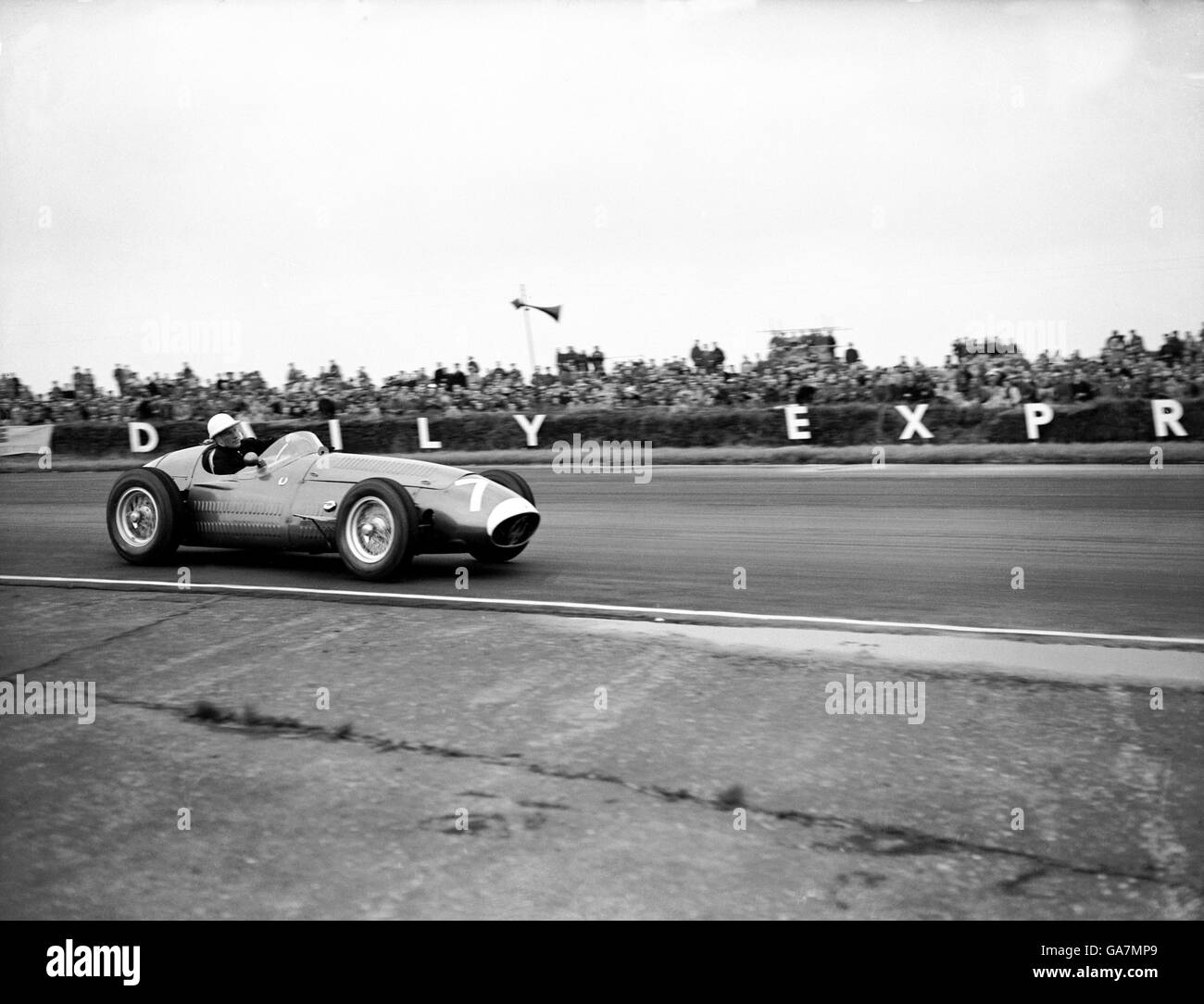 Course automobile Formula One - Grand Prix de Grande-Bretagne - Silverstone. Stirling Moss en action dans sa Maserati Banque D'Images