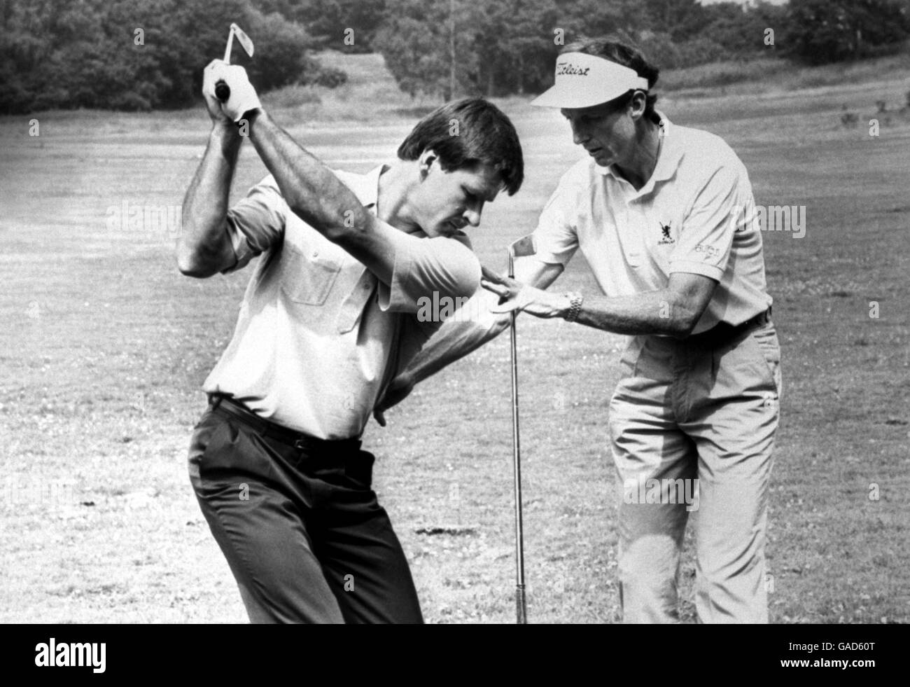 Golf.L'entraîneur David Leadbetter (r) aide à remodeler l'oscillation de Nick Faldo Banque D'Images