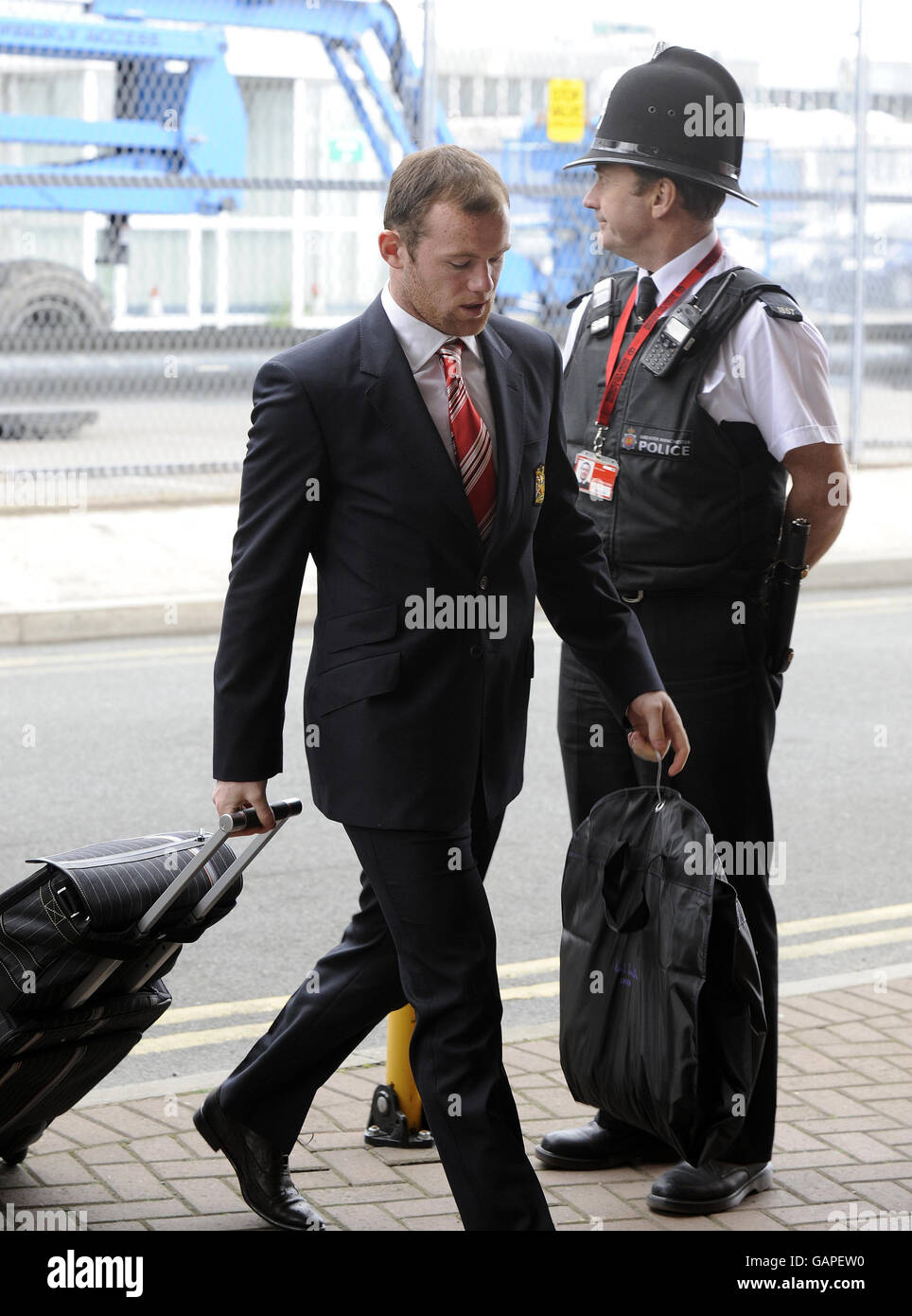 Wayne Rooney, de Manchester United, arrive à l'aéroport de Manchester, à Manchester. Banque D'Images