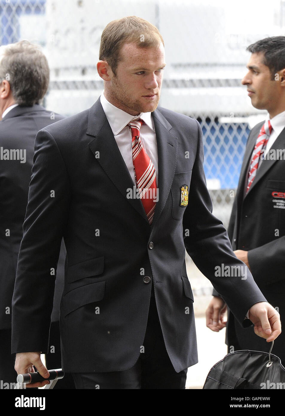 Wayne Rooney de Manchester United arrive à l'aéroport de Manchester. Banque D'Images