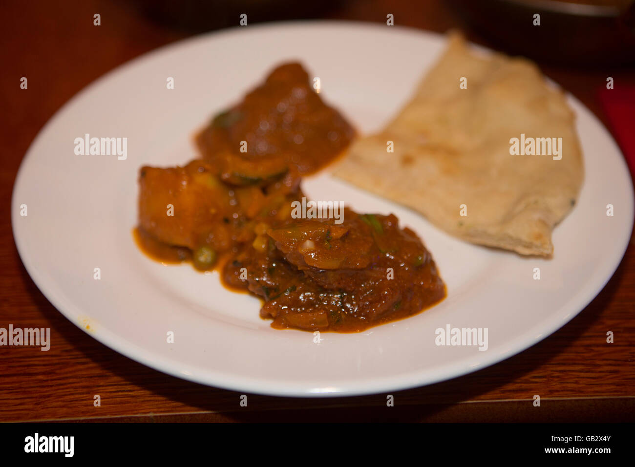 Curry servi dans Brick Lane, Londres, Angleterre. Un grand nombre des restaurants de curry sont exploités par les familles du Bangladesh. Banque D'Images