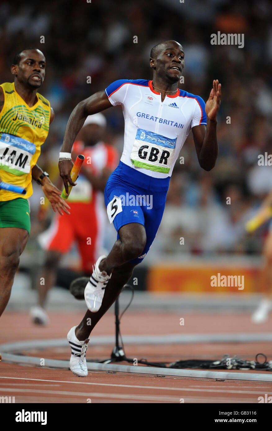Michael Bingham, en Grande-Bretagne, en action dans le 4x400m masculin chauffe au stade national de Pékin pendant les Jeux Olympiques de Beijing 2008 en Chine. Banque D'Images Michael Bingham, en Grande-Bretagne, en action dans le 4x400m masculin chauffe au stade national de Pékin pendant les Jeux Olympiques de Beijing 2008 en Chine. Banque D'Images