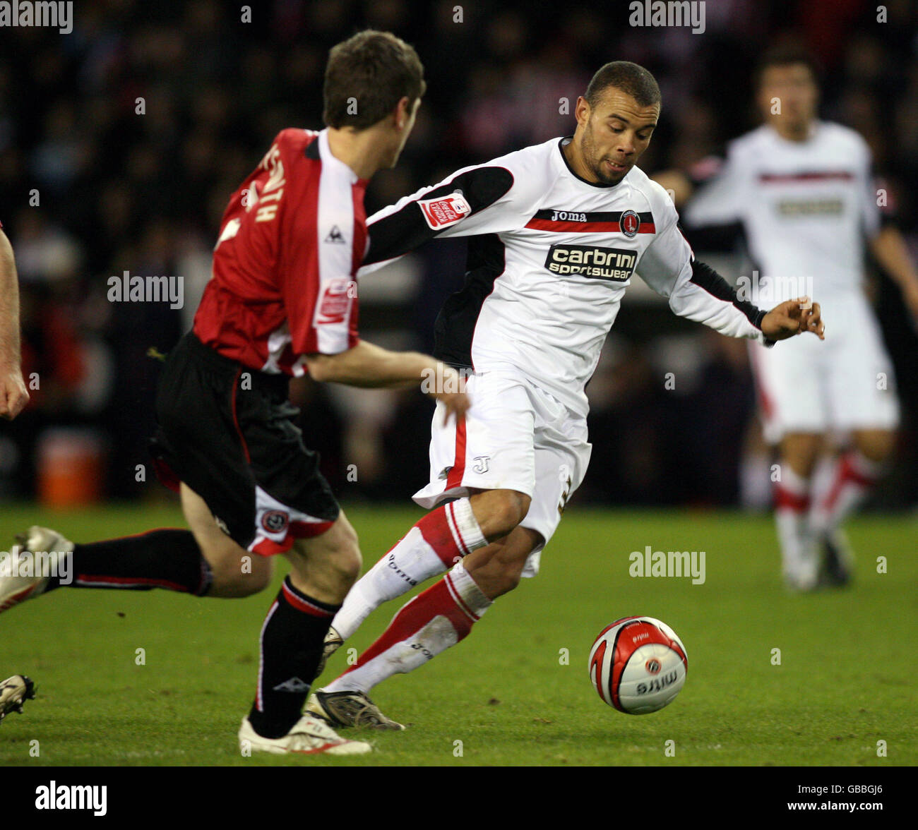 Football - Championnat de la ligue de football Coca-Cola - Sheffield United v Charlton Athletic - Bramall Lane.Gary Naysmith de Sheffield United et Deon Burton de Charlton Athletic lors du match de championnat Coca-Cola à Bramall Lane, Sheffield. Banque D'Images