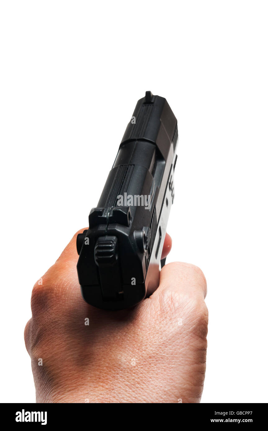 Man main tenant un pistolet Banque D'Images