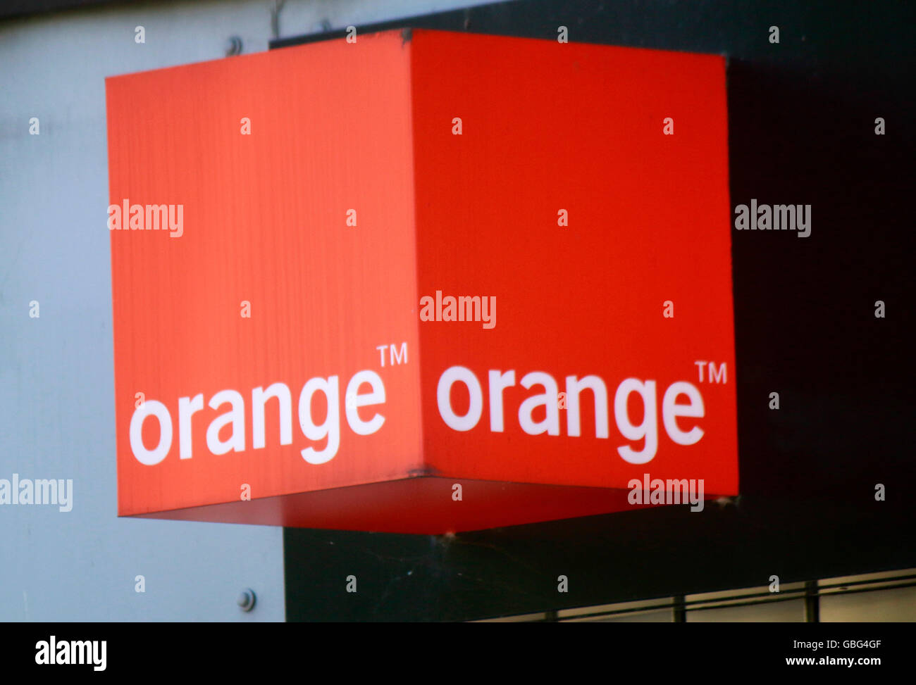 Logo das der Marke 'Orange', Swinemuende, Polen. Banque D'Images