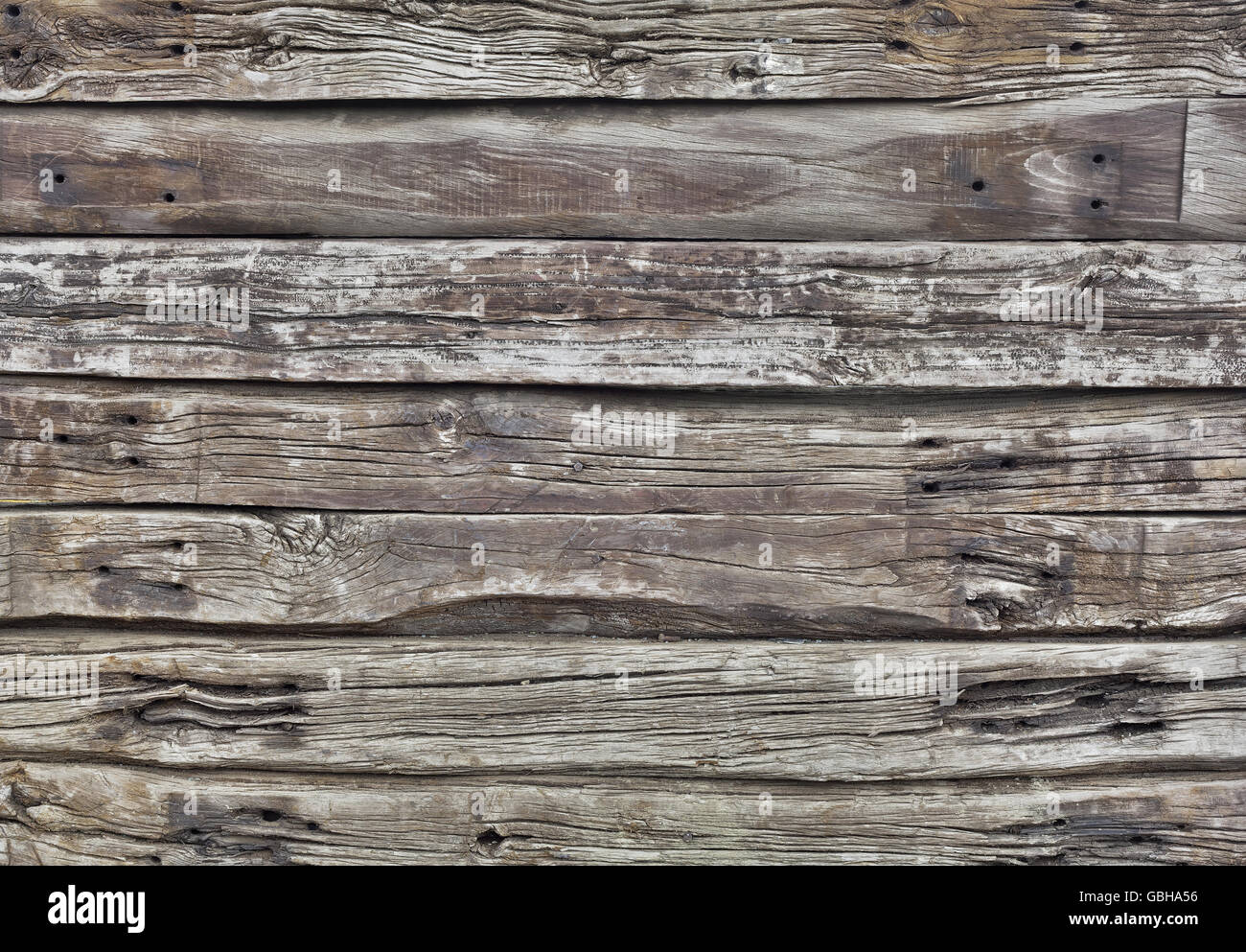 Old Weathered Wooden Plank empilés Wall Background. La texture du bois vieilli. Fond gris Banque D'Images
