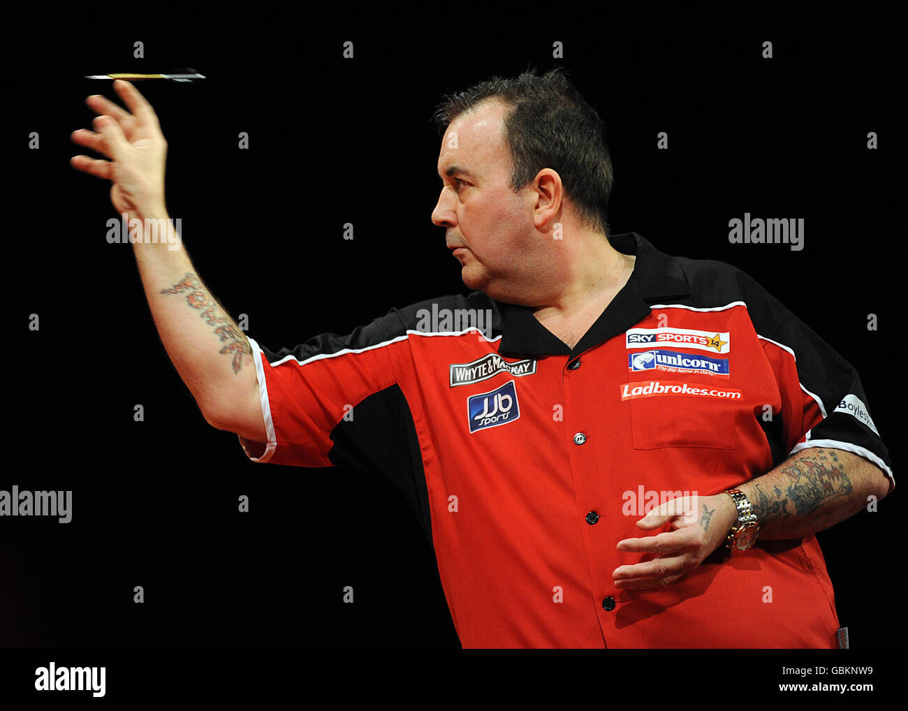 Fléchettes - Whyte & Mackay Premier League - National Ice Centre - Nottingham. Phil Taylor en action. Banque D'Images