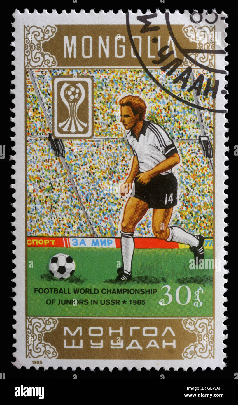 Timbres en Mongolie montrant Championnat du Monde de football des juniors en URSS vers 1985 Banque D'Images