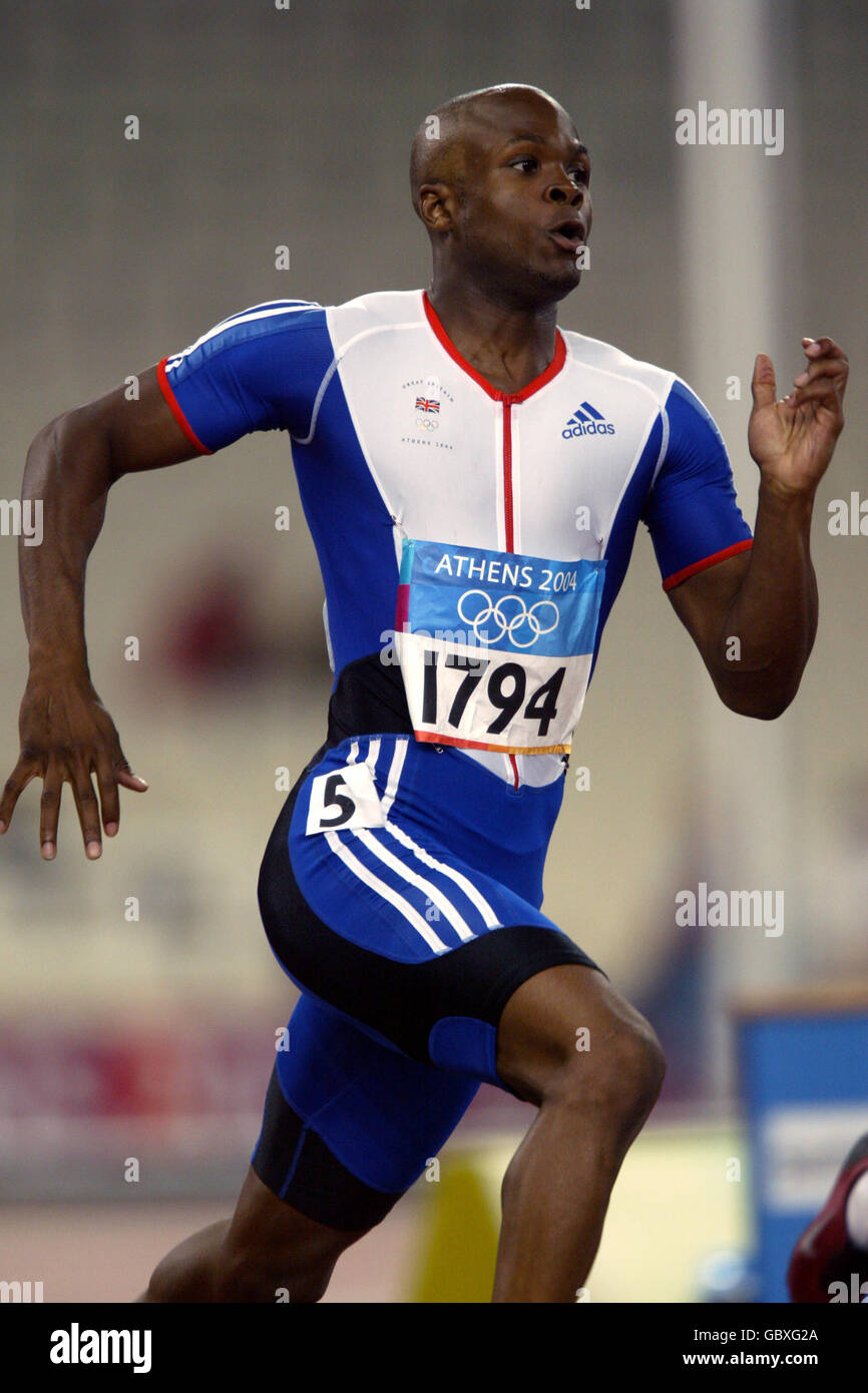 Athlétisme - Jeux Olympiques d'Athènes 2004 - 400m de Mens - Round One. Daniel Caines, Grande-Bretagne Banque D'Images