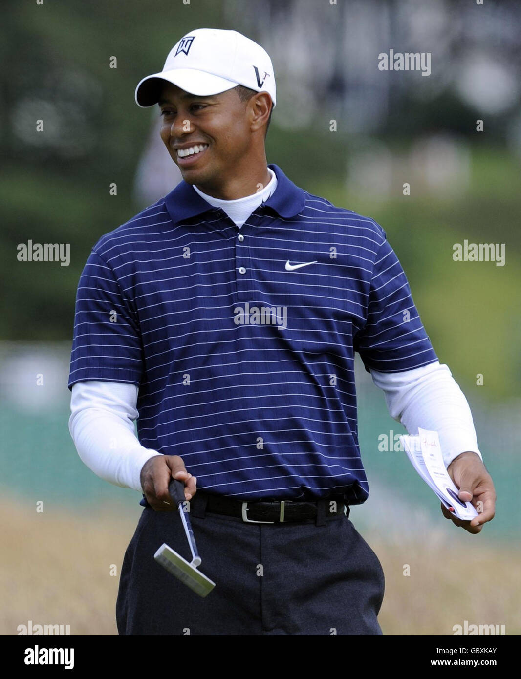 Le Tiger Woods des États-Unis sourit lors du cycle d'entraînement au Turnberry Golf Club, Ayrshire. Banque D'Images
