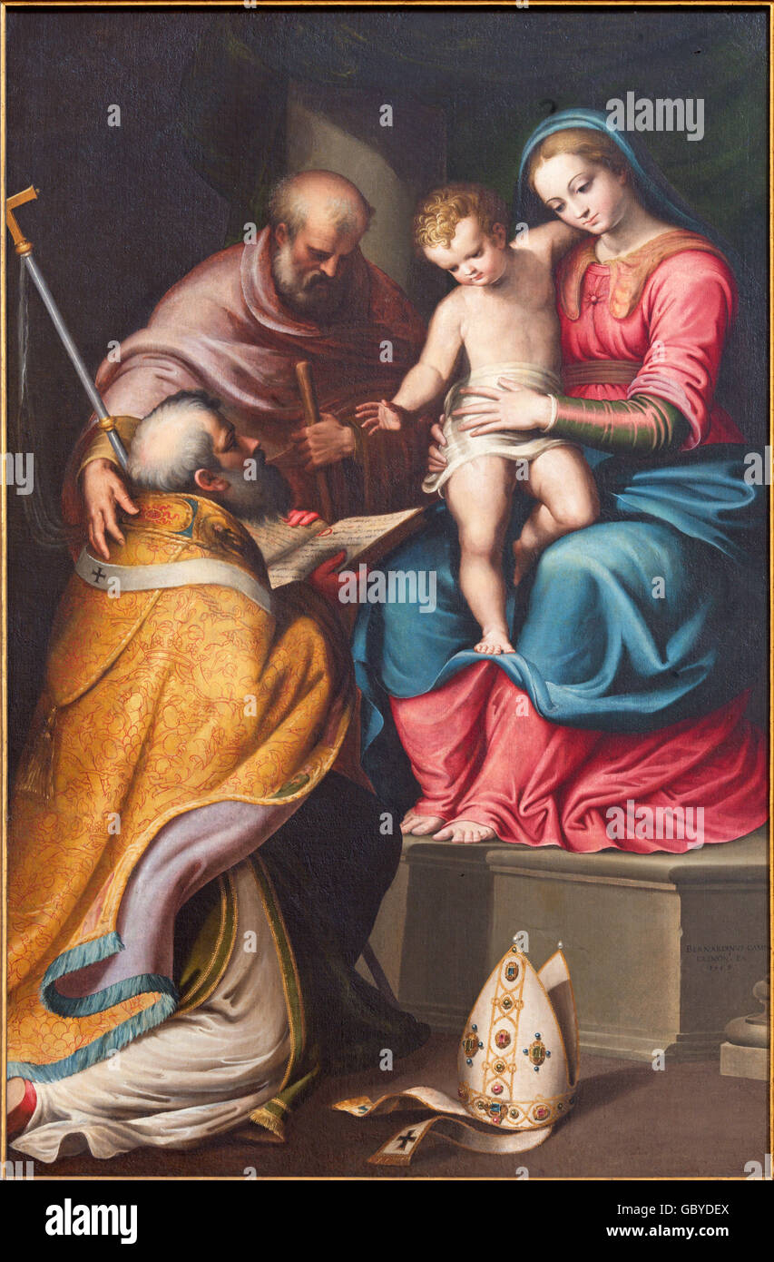CREMONA, ITALIE - 24 MAI 2016 : la peinture de la Sainte Famille avec le st. Nicolas à l'église Chiesa di Santa Agata Banque D'Images