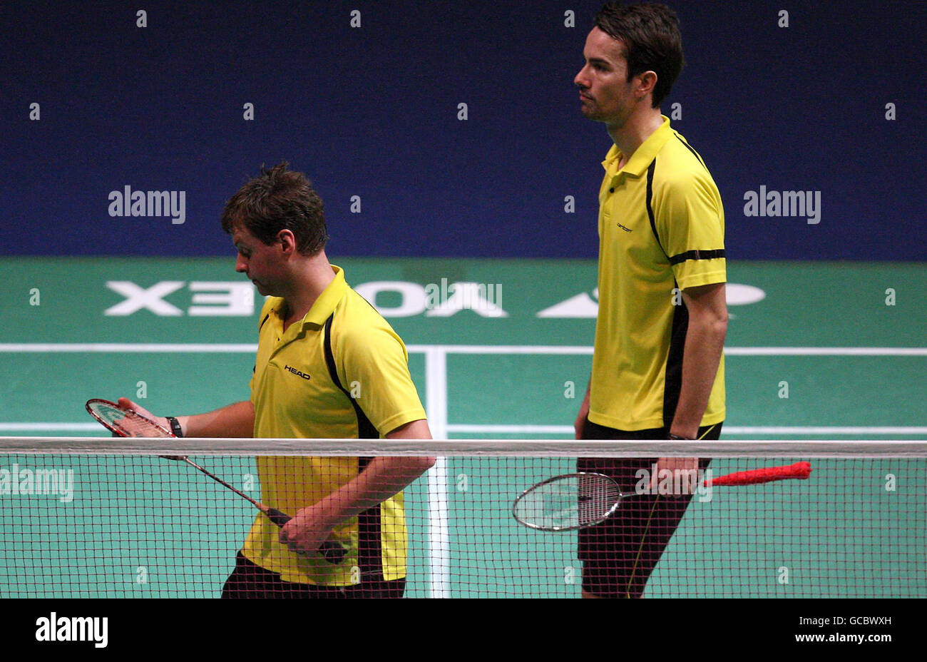 Anthony Clark et Nathan Robertson, en Grande-Bretagne, ont été abattus après la défaite contre Zhengdong Guo et Chen Xu, en Chine, lors des championnats de badminton Yonex All England Open au NIA, à Birmingham. Banque D'Images