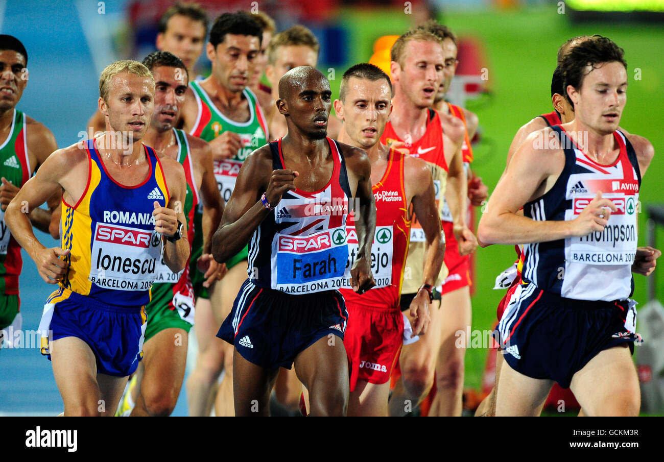 Athlétisme - Championnats d'Europe IAAF 2010 - première journée - Stade olympique.Chris Thompson (à droite) et Mo Farah (au centre), en Grande-Bretagne, en route vers la première et la deuxième place de la finale de 10,000 mètres Banque D'Images