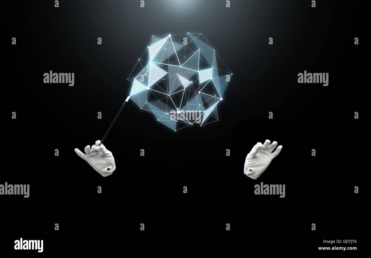 Les mains de magicien avec baguette magique montrant trick Banque D'Images