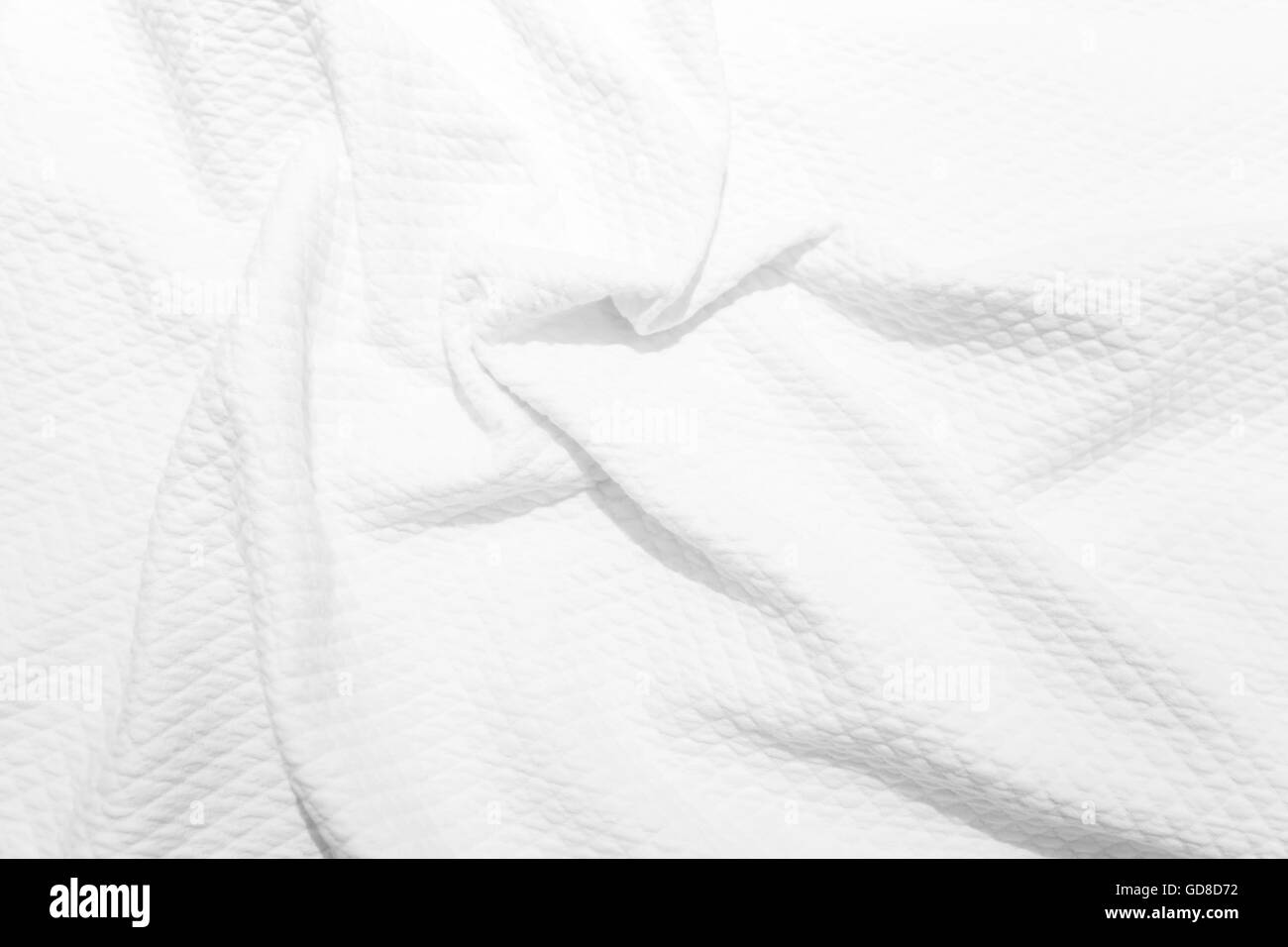 Tissu coton blanc, texture de fond photo de couverture froissée, selective focus Banque D'Images