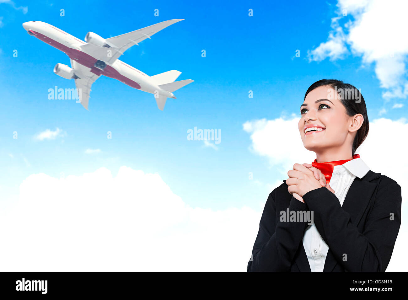 1 Femme adulte indien Air Hostess Flying Airplane regardant des aspirations Banque D'Images
