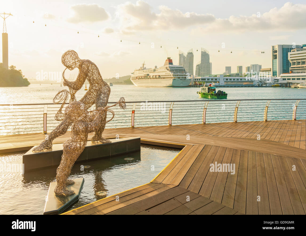 Singapour - Mars 1, 2016 : sculptures métalliques, de musiciens de jazz et de Singapour au Harbourfront Centre de croisière et Sentosa Boardwalk menant de la partie continentale de l'île de Sentosa à Singapour. Au coucher du soleil Banque D'Images Singapour - Mars 1, 2016 : sculptures métalliques, de musiciens de jazz et de Singapour au Harbourfront Centre de croisière et Sentosa Boardwalk menant de la partie continentale de l'île de Sentosa à Singapour. Au coucher du soleil Banque D'Images