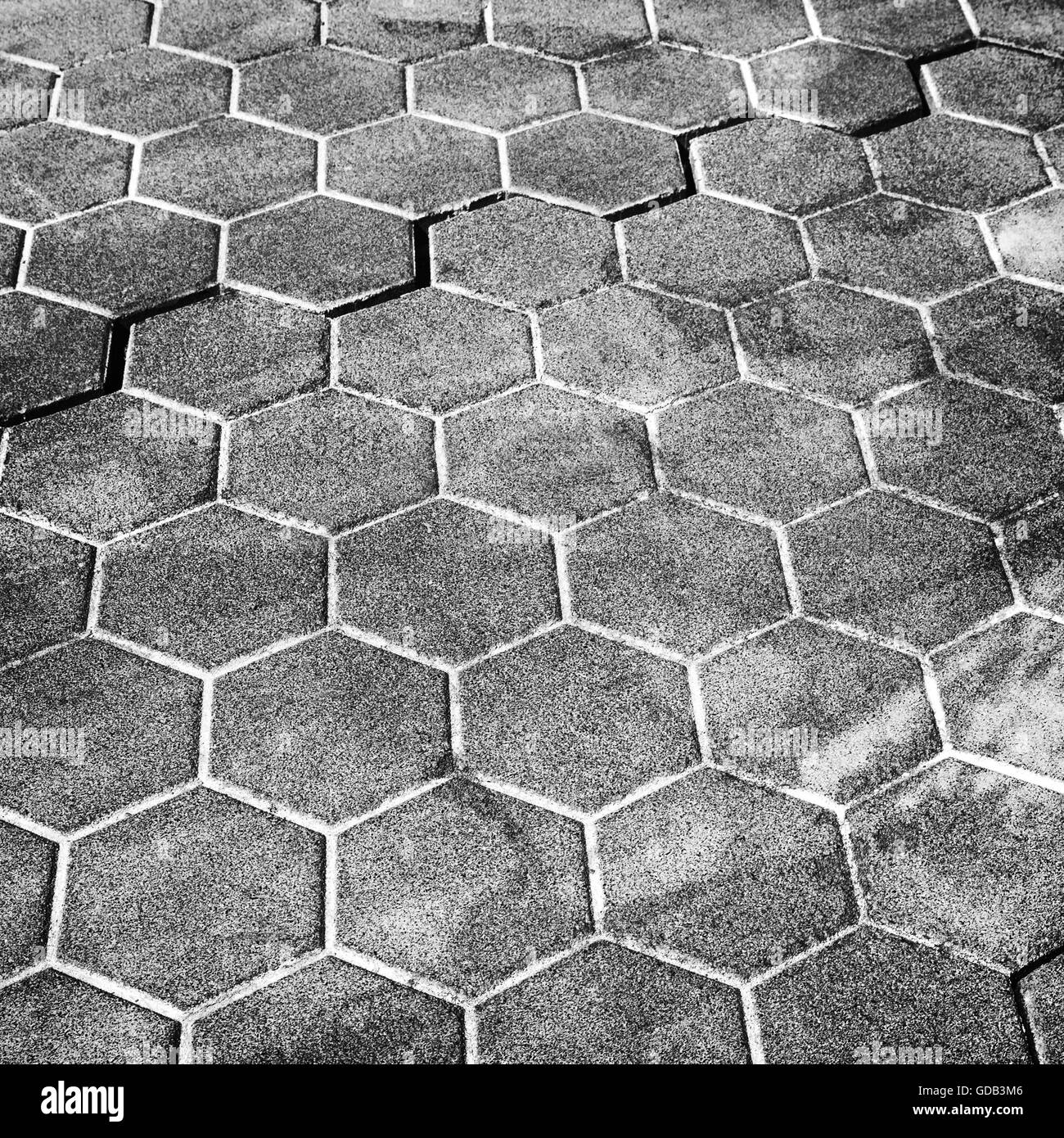 Gris foncé, motif nid d'cobblestone street texture de fond de la chaussée Banque D'Images