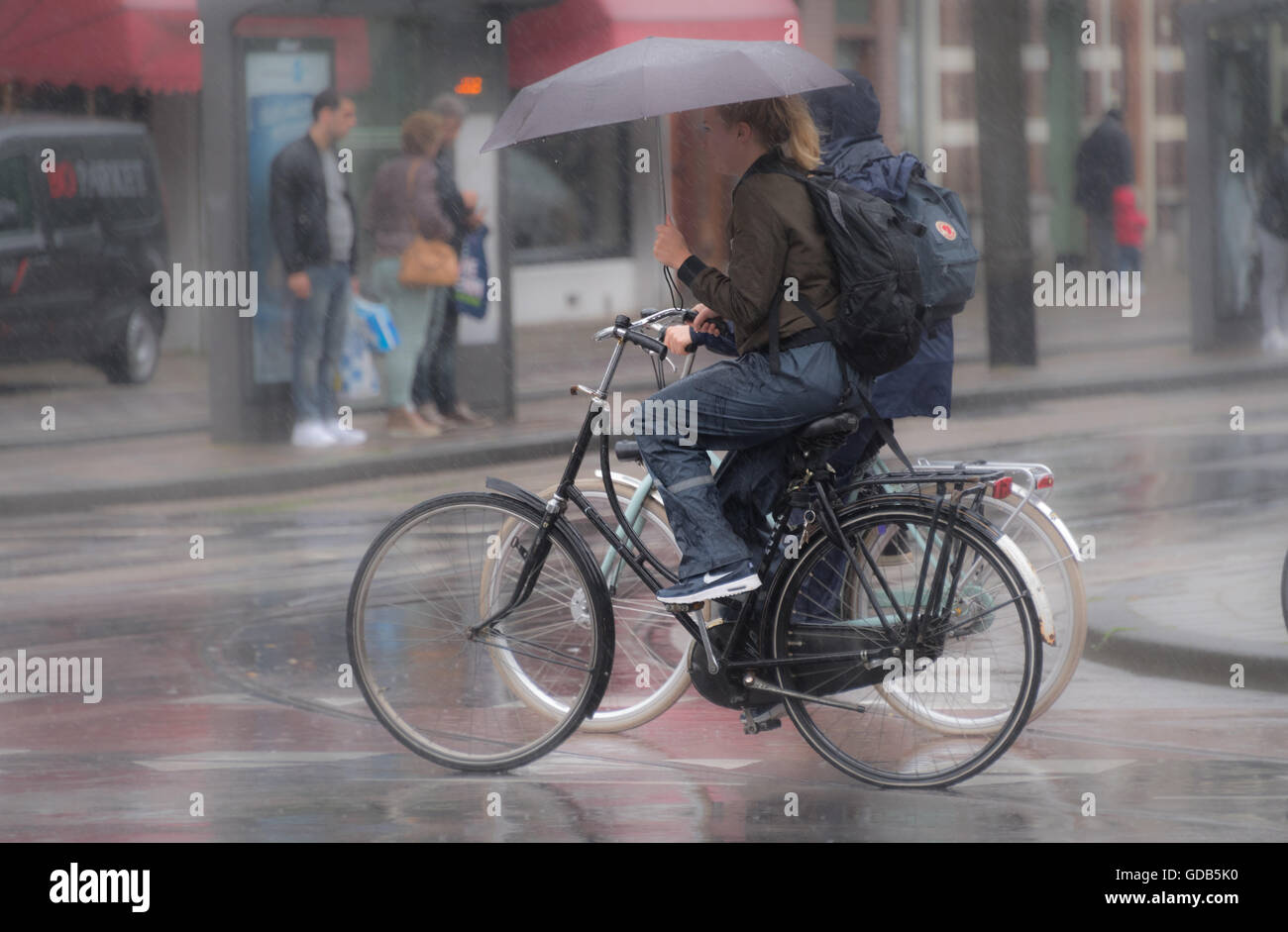 riding a road bike in the rain