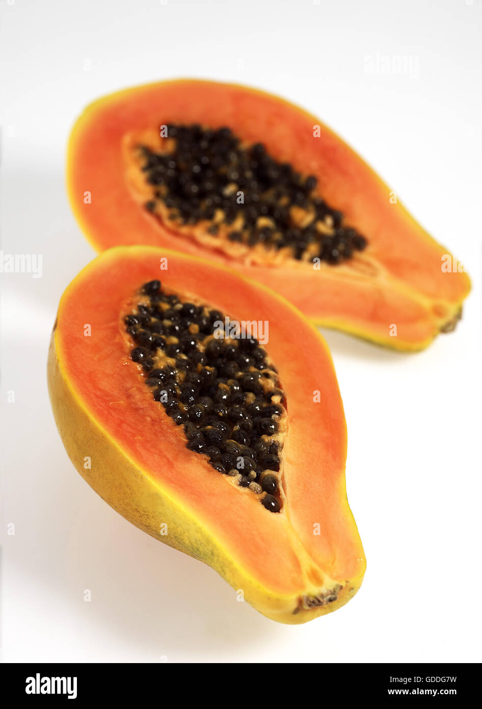 Paw Paw ou de papaye, Carica papaya, Fruits Exotiques contre fond blanc Banque D'Images