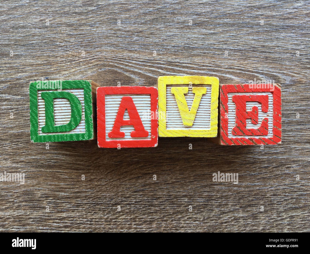 Dave nom écrit avec une cale en bois lettre toys Photo Stock - Alamy