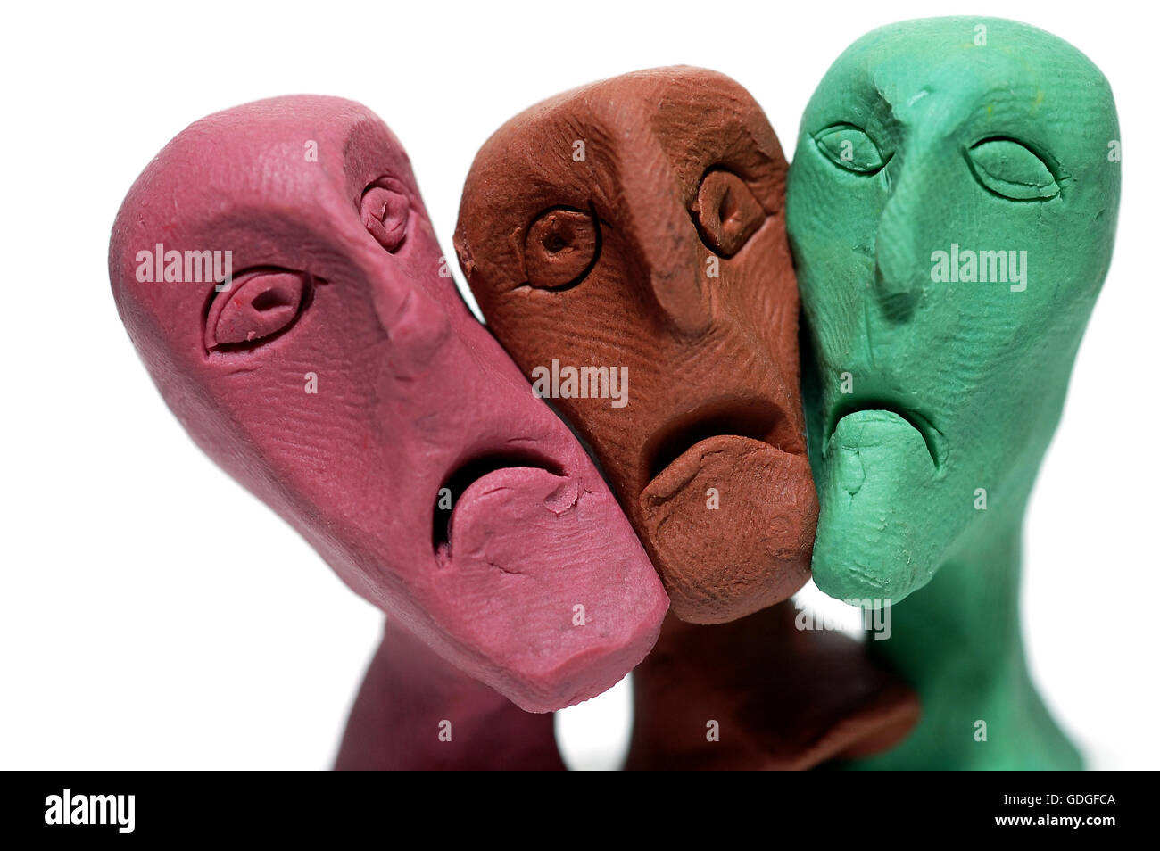 Les hommes avec faces en plasticine laid Banque D'Images