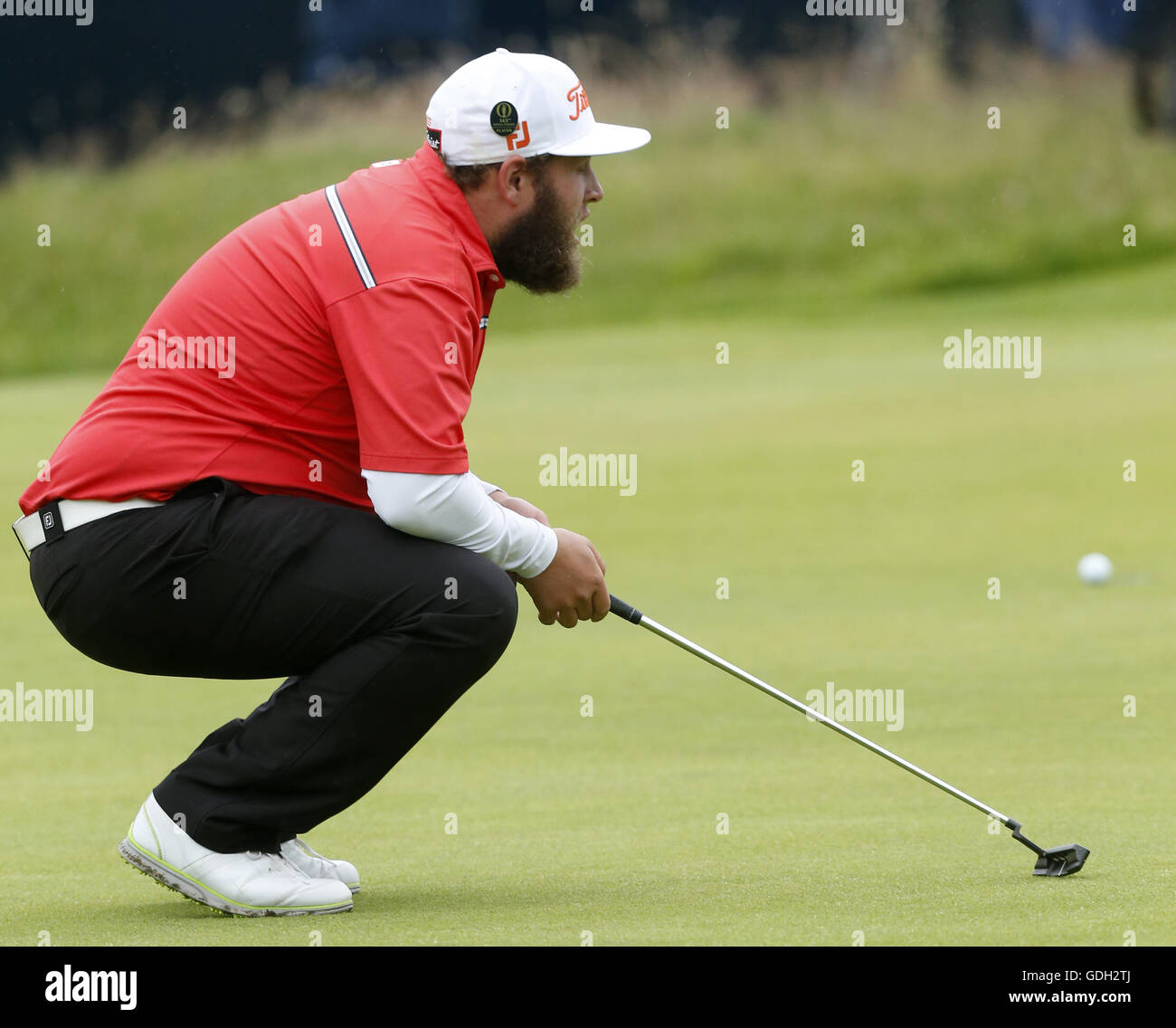 L'Angleterre Andrew Johnston réagit après avoir vu son mis sur le 18ème green au cours de la troisième journée de l'Open Championship 2016 au Royal Troon Golf Club, South Ayrshire. Banque D'Images