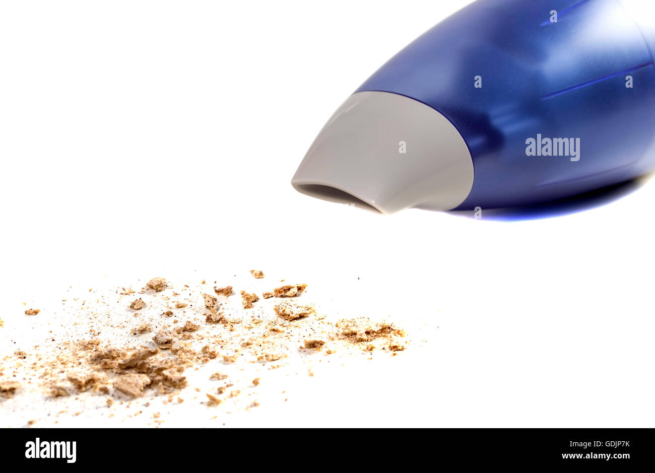 Aspirateur à main de miettes sur fond blanc Banque D'Images