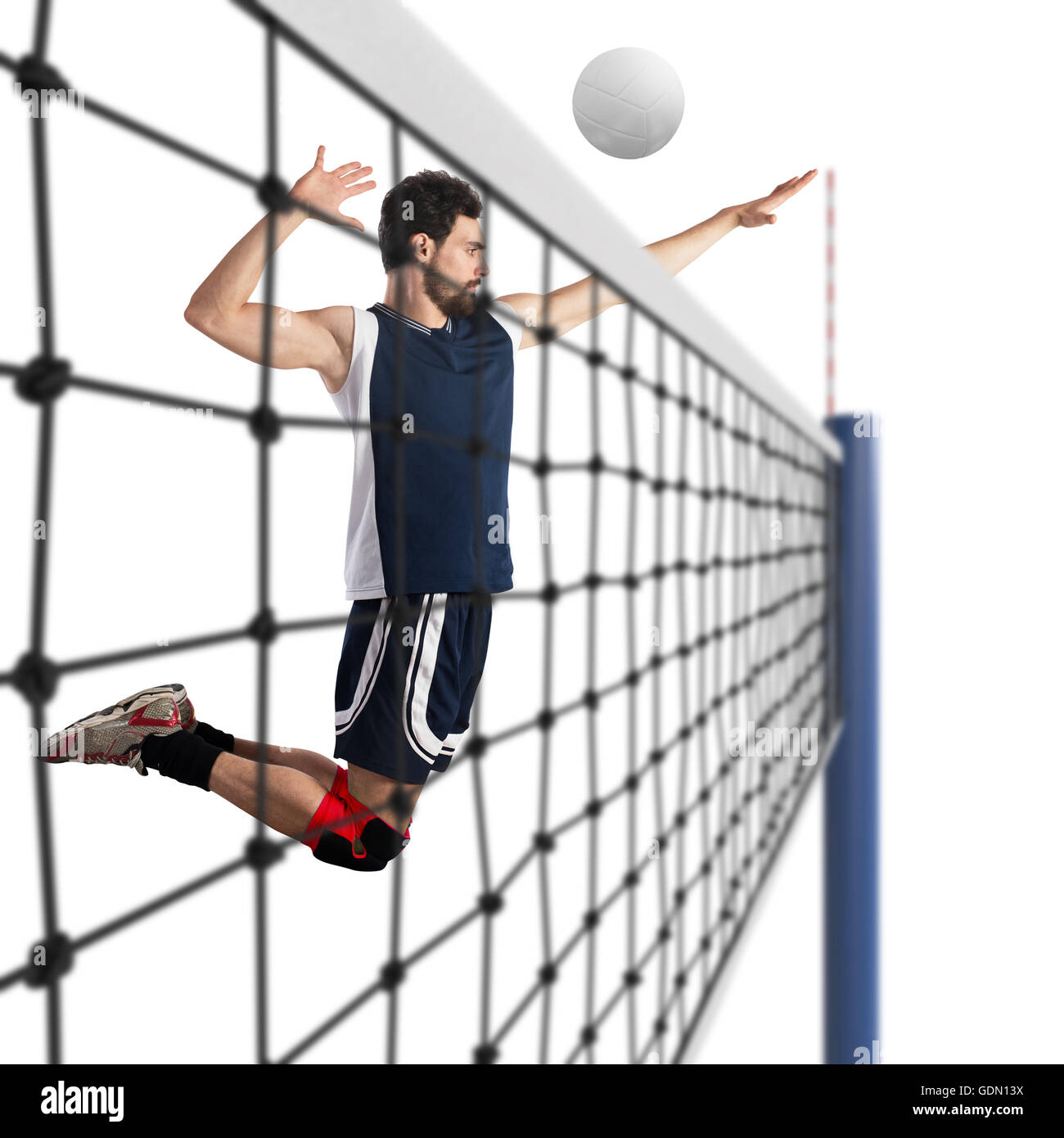 Le joueur frappe le ballon de volley-ball Banque D'Images